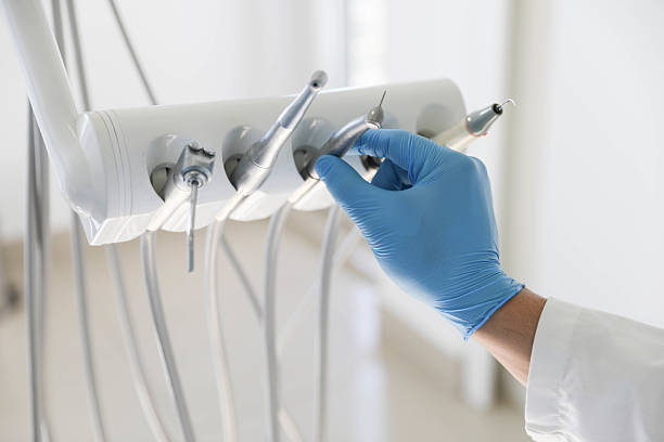 Professional Tooth Extraction technician working in Justice, IL